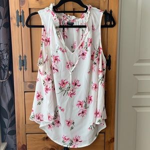 Floral print sleeveless blouse